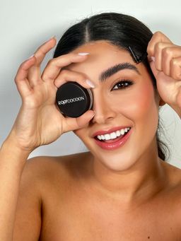 Eyebrow gel with a spoolie brush