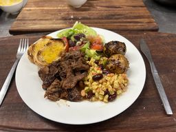 Spitbraai Lamb and roast potatoes +2 sides