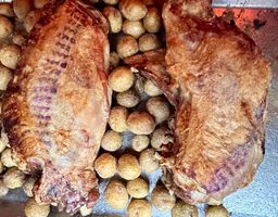 Spitbraai Lamb and roast potatoes +2 sides