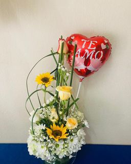 Arreglo en girasoles y rosas 