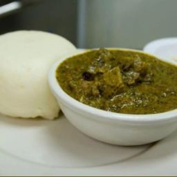 Rwandan Food Isombe with meat and ugali