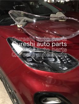 Kia Sportage head light lens 