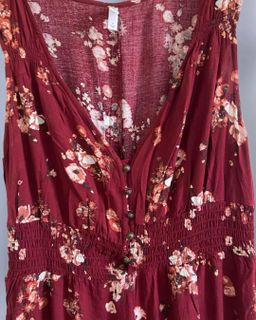 Floral Print Sleeveless V-Neck Smocked Waist Button-Front Jumpsuit.