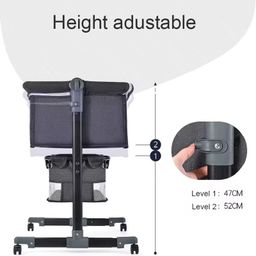 Baby besides crib bed 