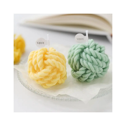 VELAS DECORATIVA EN FORMA DE ROLLO DE TEJER