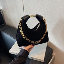 Velvet material shoulder bag.
