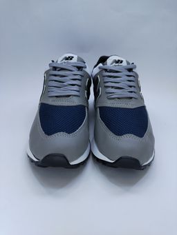NEW BALANCE GRIS CON AZUL