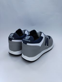 NEW BALANCE GRIS CON AZUL
