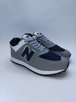 NEW BALANCE GRIS CON AZUL