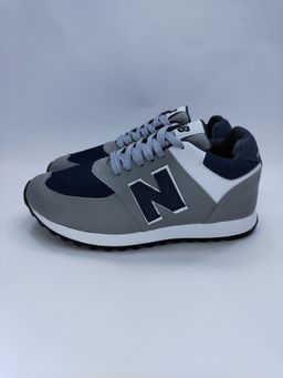 NEW BALANCE GRIS CON AZUL