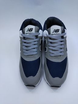 NEW BALANCE GRIS CON AZUL