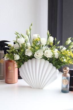 مزهرية بتصميم صدفة بحرية