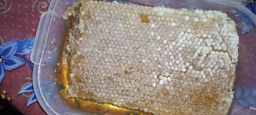 La boîte de 1,4 kg miel en rayon 