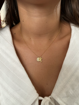 Golden pendent cross