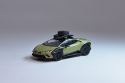 SPARKY MODEL 1/64 LAMBORGHINI HURACÁN STERRATO WITH A ROOF RACK AND A WHEEL - GREEN