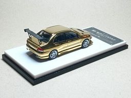 MODELCOLLECT 1/64 MITSUBISHI EVO 7 - GOLD CHROME
