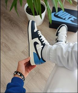 Nike Dunk Low Retro “White Grey” – Crisp Monochrome Sneaker