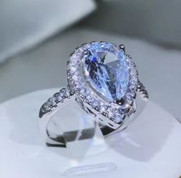 Milan Pear-cut Halo Ring