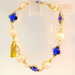 Classic White Pearl Bracelet with Hand-Wrapped Copper K9 Crystal Blue Sapphire Clover