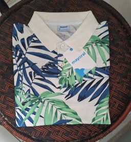 Polo feuilles vertes