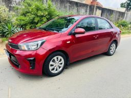 KIA PEGAS 2023 ROUGE