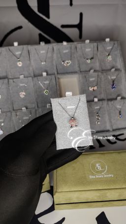 Collier argenté pierre rose avec petit noeud 