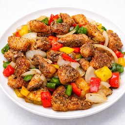 Stir-fried sea bass with black pepper ปลากระพงผัดพริกไทยดำ