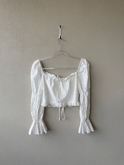 Blusa blanca mangas largas