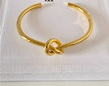 Gold bracelet knot