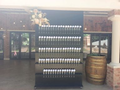 100 glass champagne wall hire