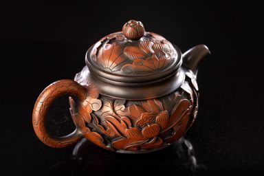 Chinese handmade teapot from Jianshui purple ceramics Lotus