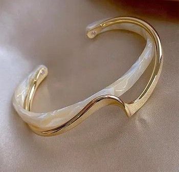 Layered twist cuff