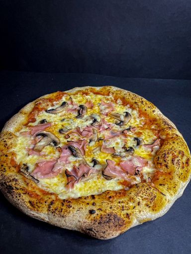 Pizza de Jamón y Champiñones