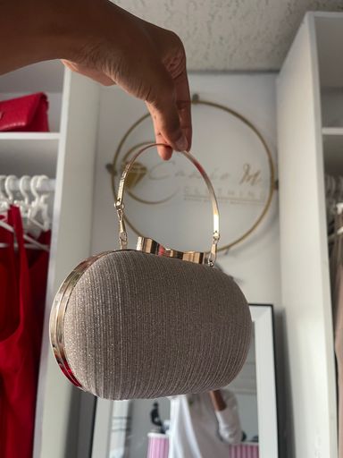 Egg shaped Gold embellished clutch