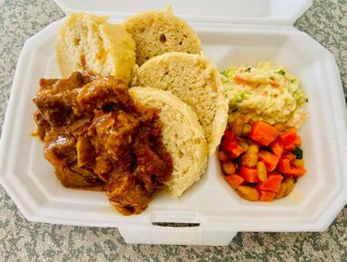 Dumplings served with Beef Stew & 3 sides