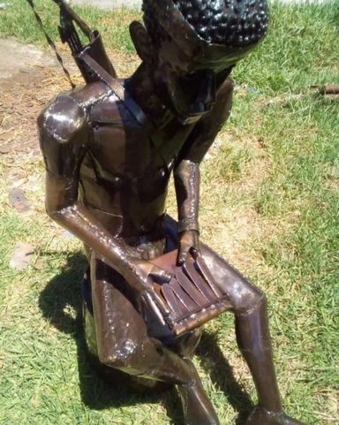 Man with a mbira instrument