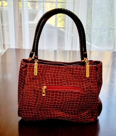 Maroon pretty spacious handbag 