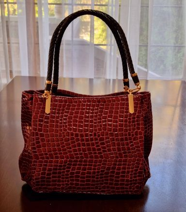 Maroon pretty spacious handbag 