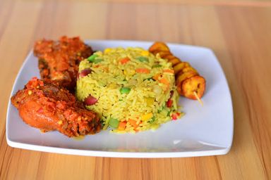 Fried rice and chicken (with plantain or salad)