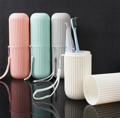 Portable travel toothbrush holder  each green, grey, pink and pink