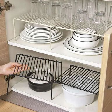 Expandable shelf raiser