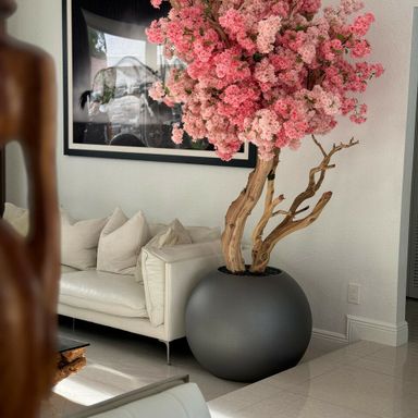 Two tone cherry blossom in a matte brown metal planter