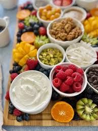 Yogurt & Granola, Fresh Fruit Plate, Fruit Juice, Coffee or Tea 