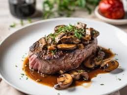 Beef Tenderloin Steak with Mushroom Sauce and Chips