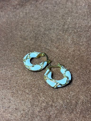 White earrings with gems