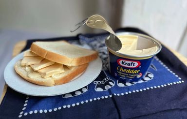 Kraft cheddar cheese tin 