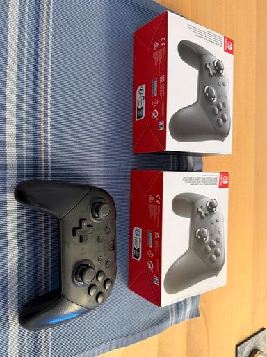 Nintendo Switch OLED, 2 jeux, 2 manettes EN ABSOLUMENT ÉTAT NEUF !