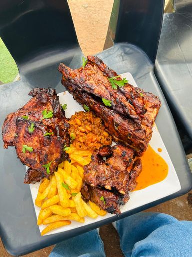 Small pork ribs & small beef ribs and spine with 1 side and chakalaka 