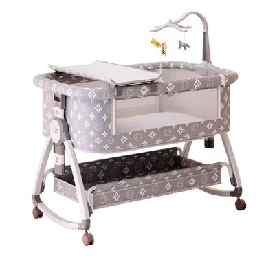Baby besides crib bed 