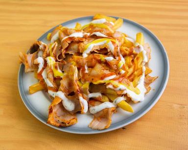 Pedrata (Patatas con carne y salsa)